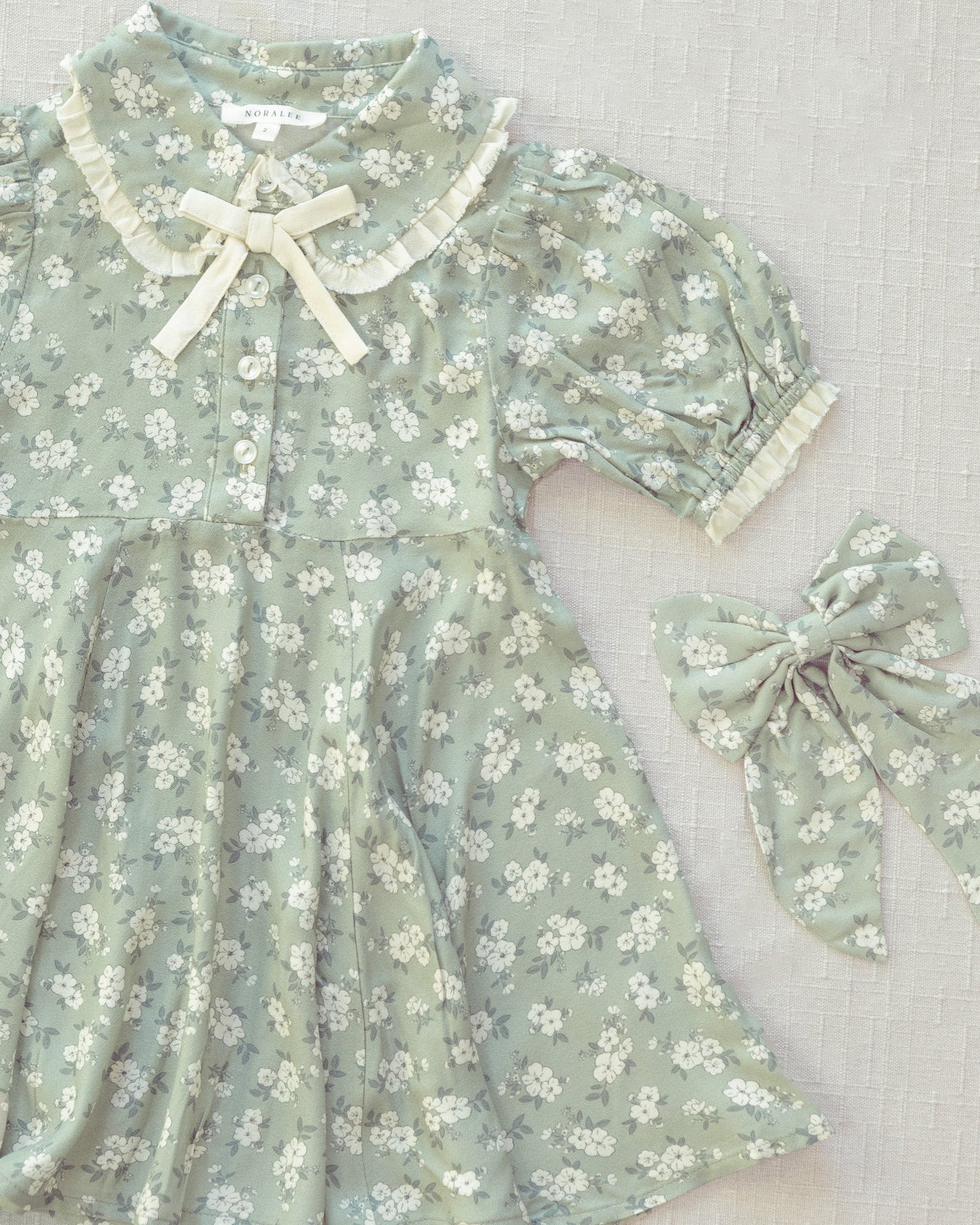 Everly Bow Blossom