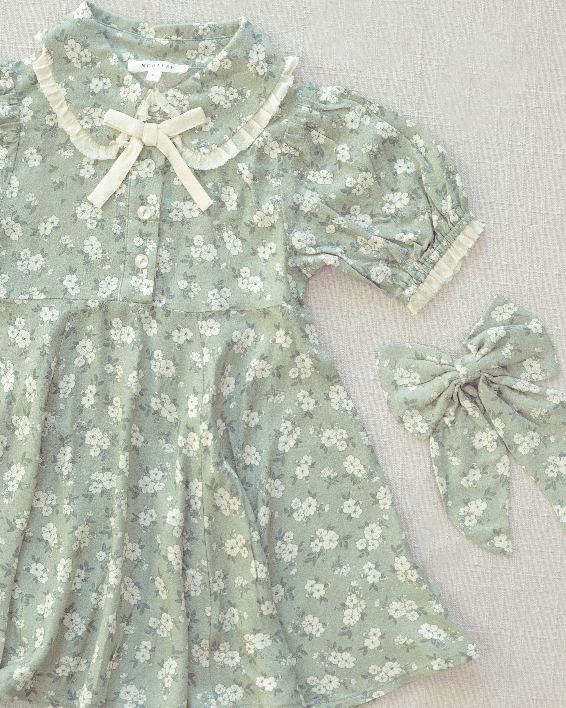 Everly Bow Blossom
